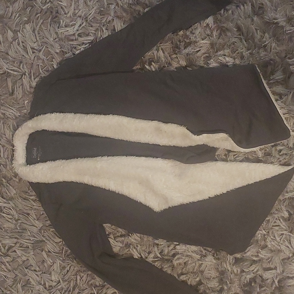A fur lined dark gray cardigan